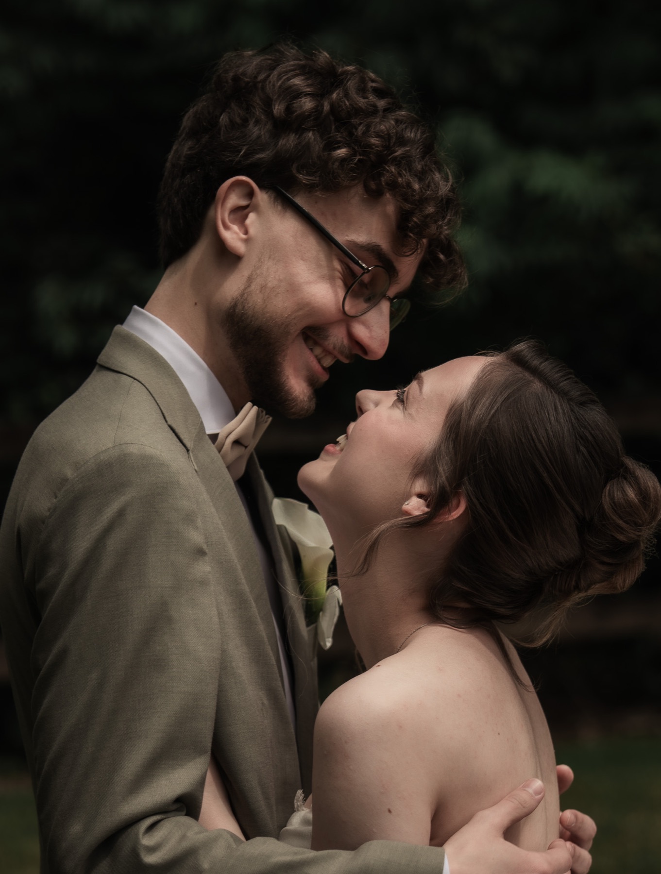 Bride and groom laughing naturally together