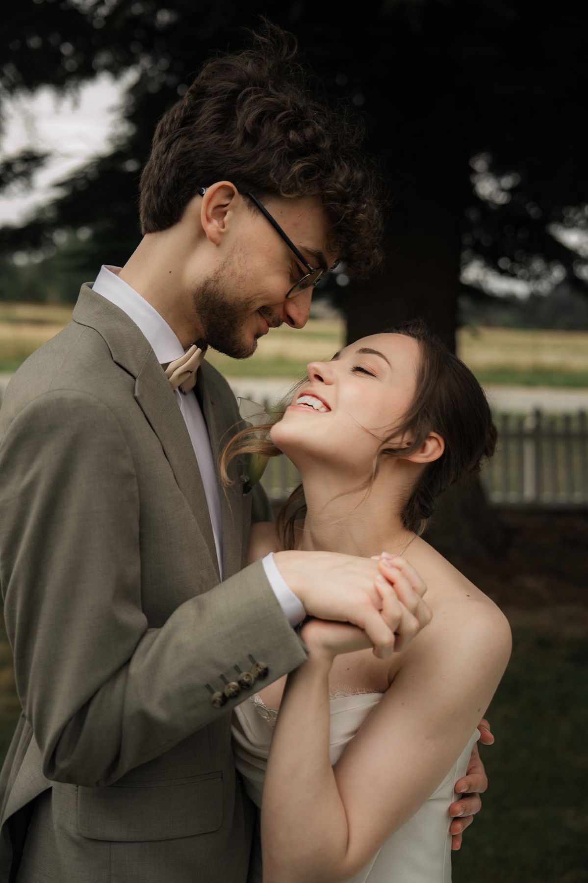 Wedding couple holding each other closely