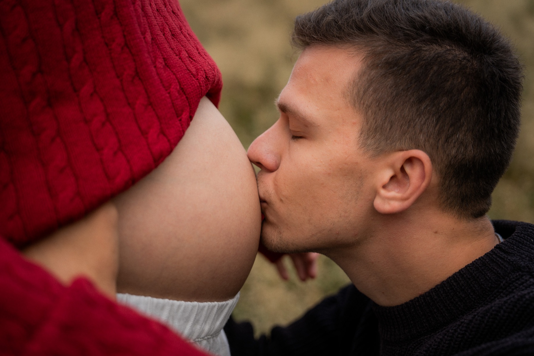 Expecting parents sharing a close moment